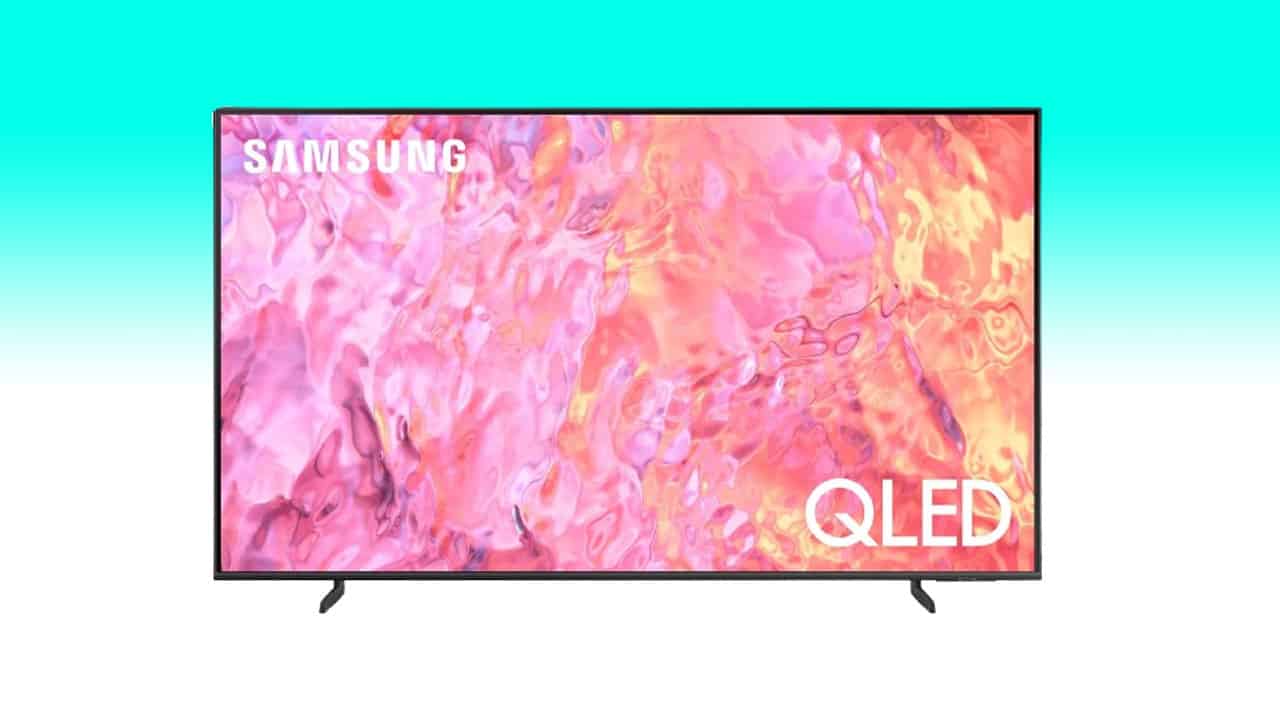 A Samsung QLED TV deal displaying a vibrant, abstract pink and yellow image.
