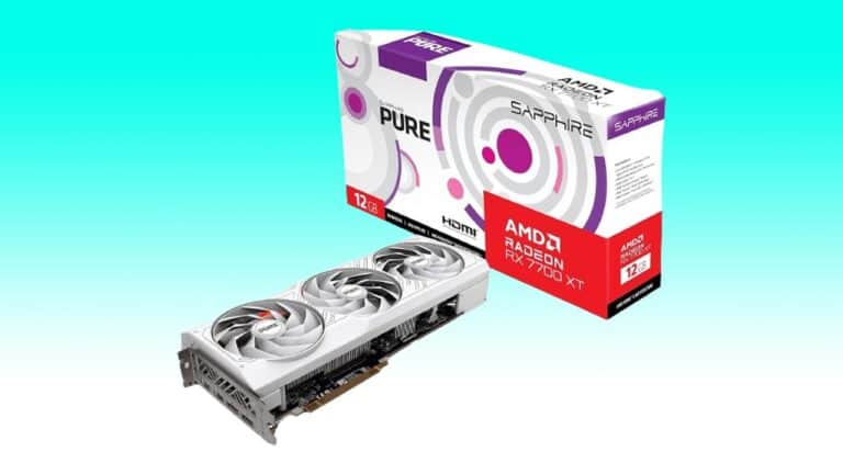 An AMD Radeon RX 7700 XT graphics card next to its retail box, featuring a white and purple design, against a split turquoise and light green background.