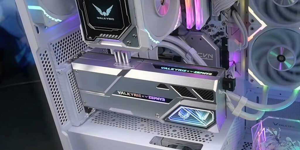 Interior of a high-performance gaming pc with illuminated components, including RTX 4080 ram sticks and cooling fans, featuring valkyrie branding.