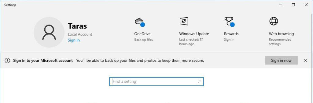 Screenshot of Windows 10 settings window showing user "taras" logged in with options for OneDrive, Windows update, and a search bar labeled "find a setting".