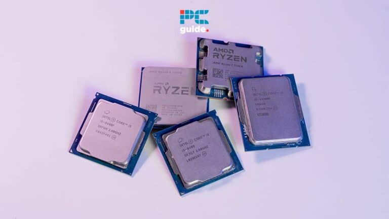 Three amd ryzen computer processors and a pc guide promotional card on a purple surface discussing signs CPU dead. Image taken by PCGuide.com