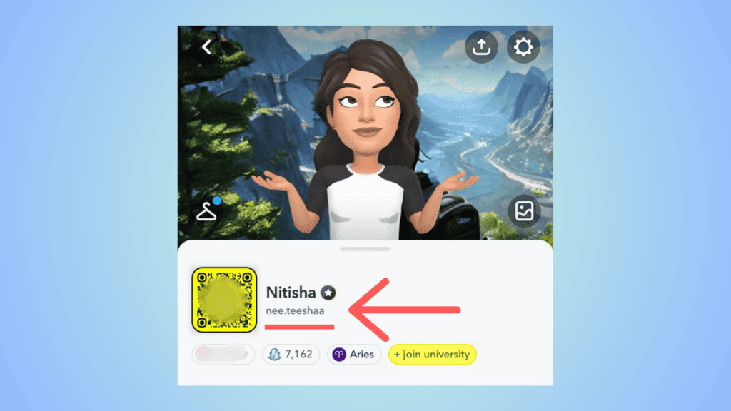 Digital avatar of a young woman named Nitisha with brown hair, wearing a white shirt, displayed in a Snapchat interface with scenic mountain backdrop.