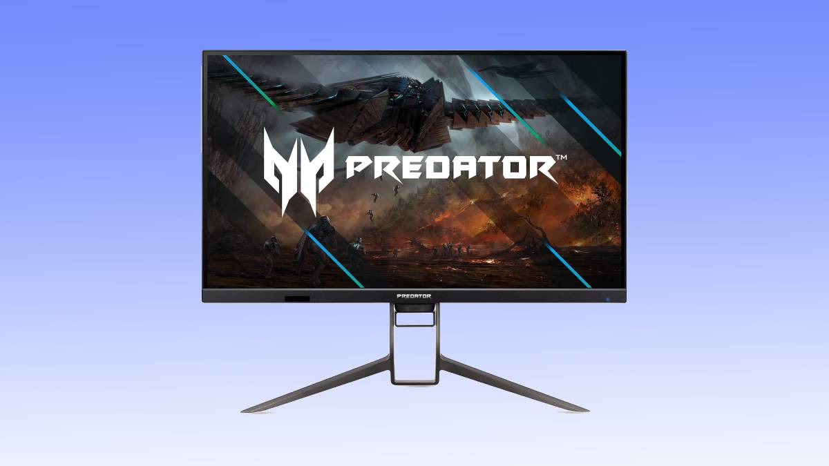 Computer monitor displaying a vibrant gaming scene, branded with the Predator logo, set against a plain blue background, currently available in a gaming monitor deal.