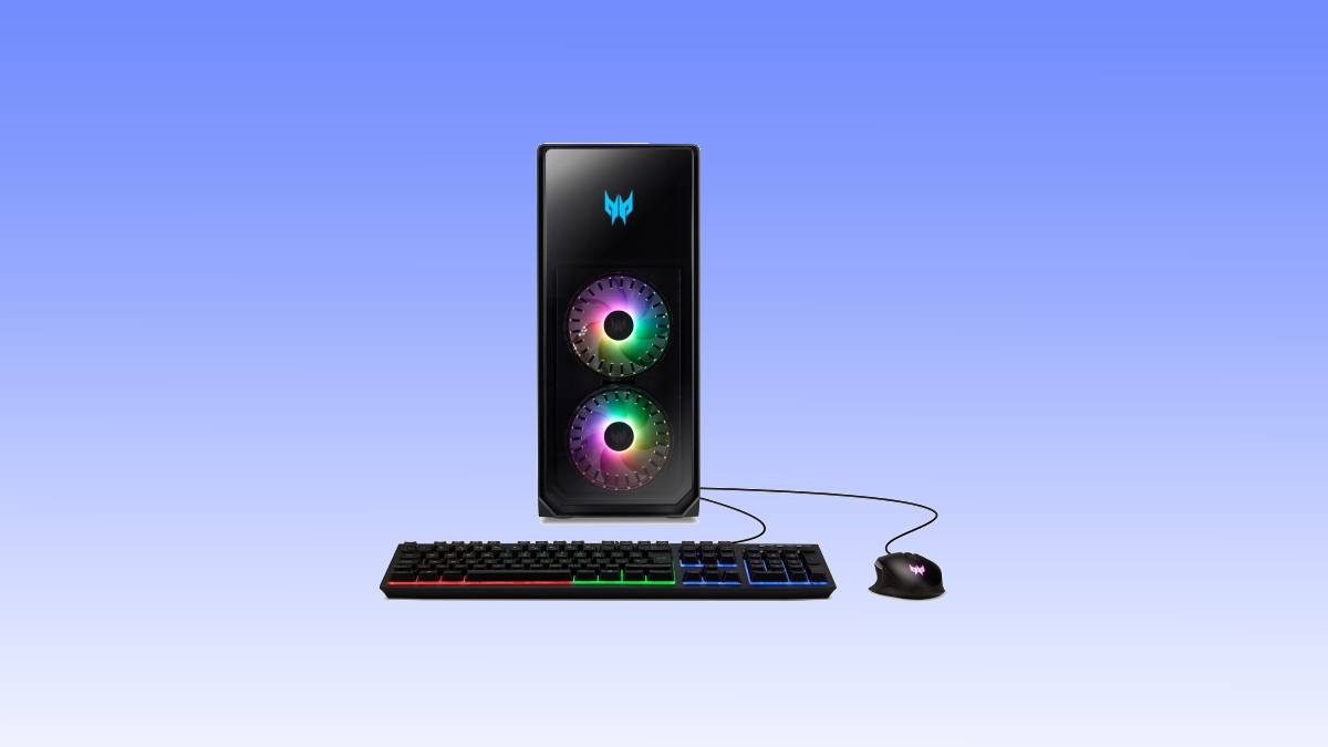 A black gaming pc deal tower with dual rgb fans, connected to a mechanical keyboard and mouse, set against a blue background.