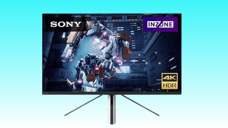 Sony INZONE M9 gaming monitor displaying a high-resolution sci-fi game scene, set on a sleek stand.