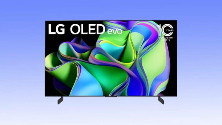 An exceptional tv deal on an LG OLED evo television displaying vibrant, abstract multicolored swirls on its screen, set against a plain blue background.