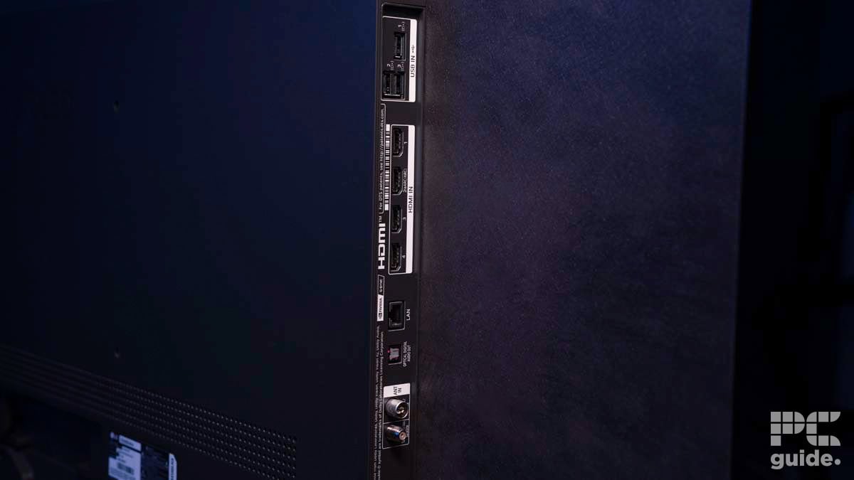 Side view of an LG C4 OLED TV showcasing various input ports including HDMI, USB, and audio/video connectors.