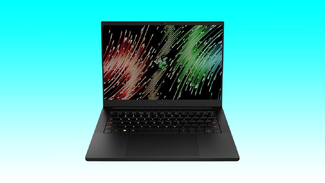 A gaming laptop with a colorful abstract screensaver displayed on the screen, set against a teal background.