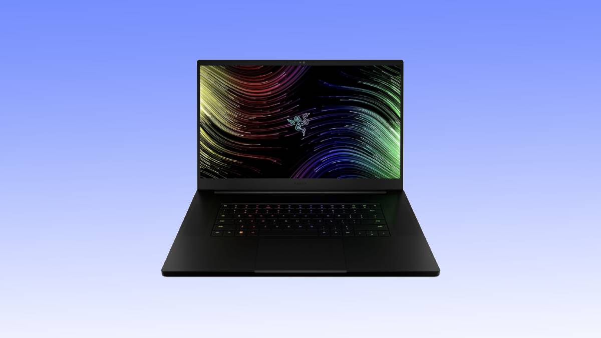 A sleek black gaming laptop with a colorful abstract pattern on the screen is centered against a gradient blue background, offering an unbeatable deal.