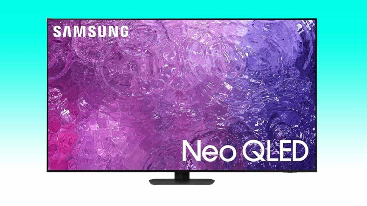 Samsung QLED 4K TV displaying vibrant purple and blue abstract art on screen, with the brand name at the top bezel.