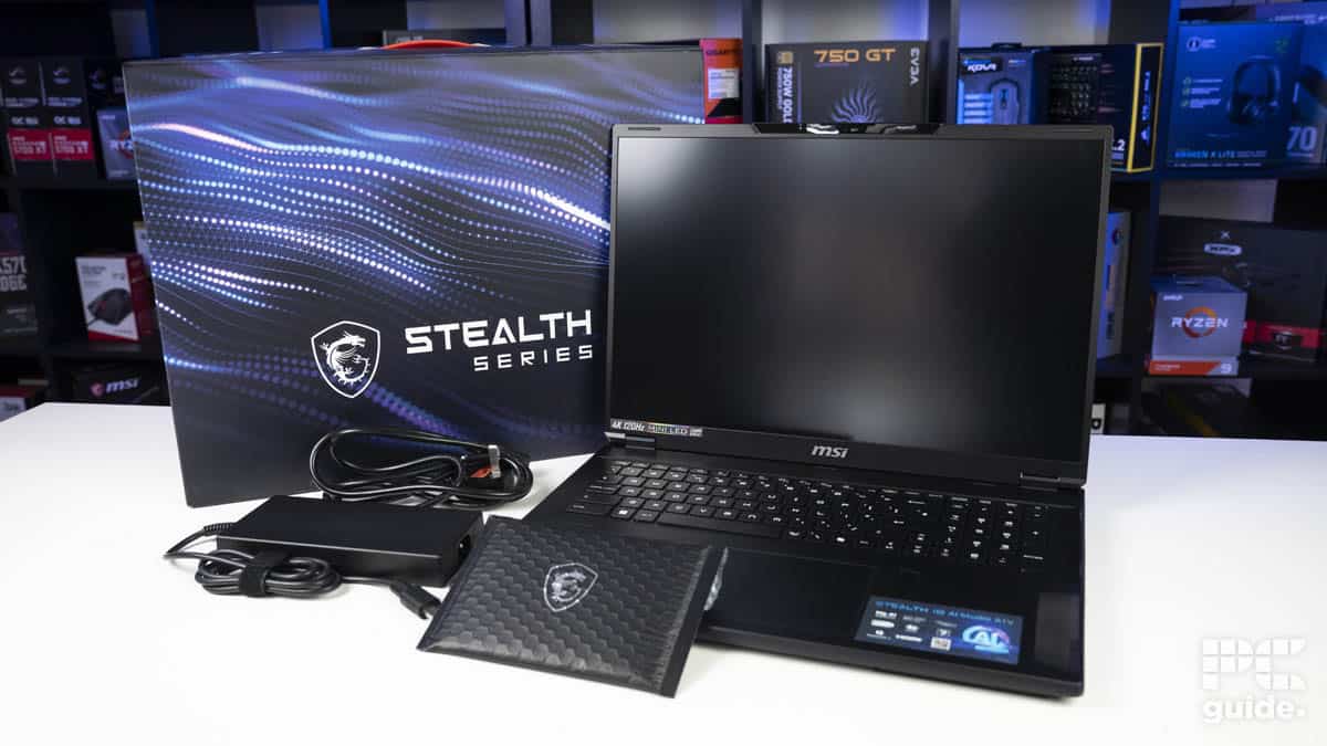 MSI Stealth 18 AI Studio A1V laptop and accessories, Image by PC Guide