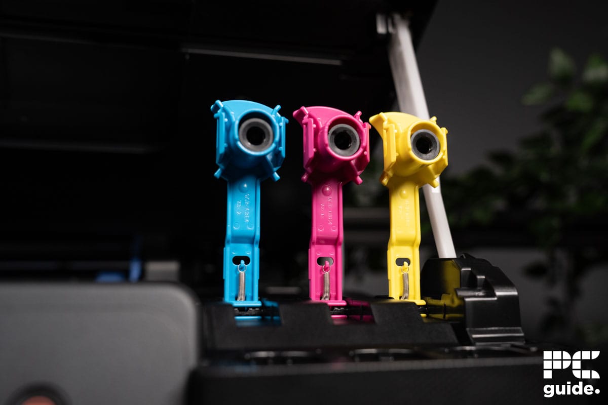 Canon PIXMA G3570 ink tank stoppers, Image by PC Guide