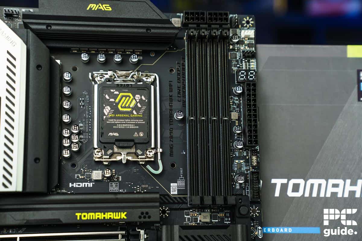 MSI MAG Z890 Tomahawk WiFi top half in front of box, Image by PC Guide