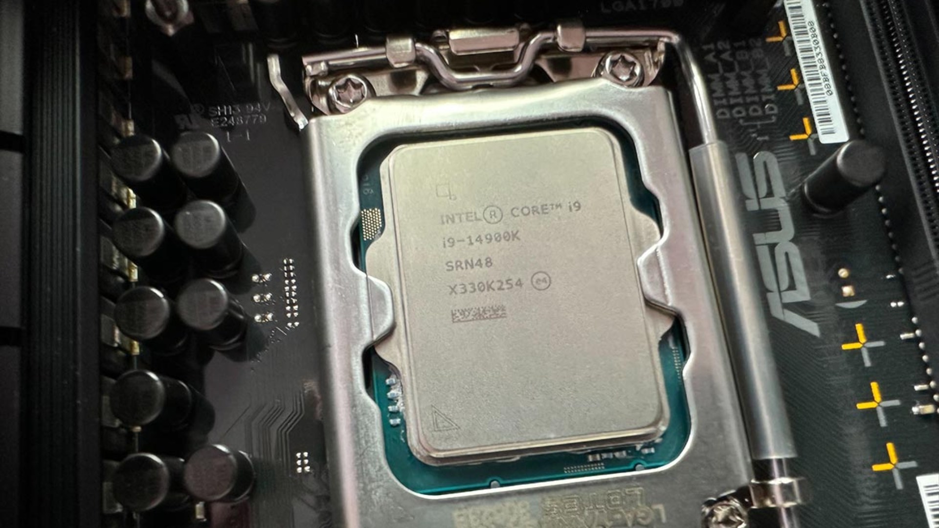 Intel Core i9-14900K CPU in motherboard socket, image by PC Guide
