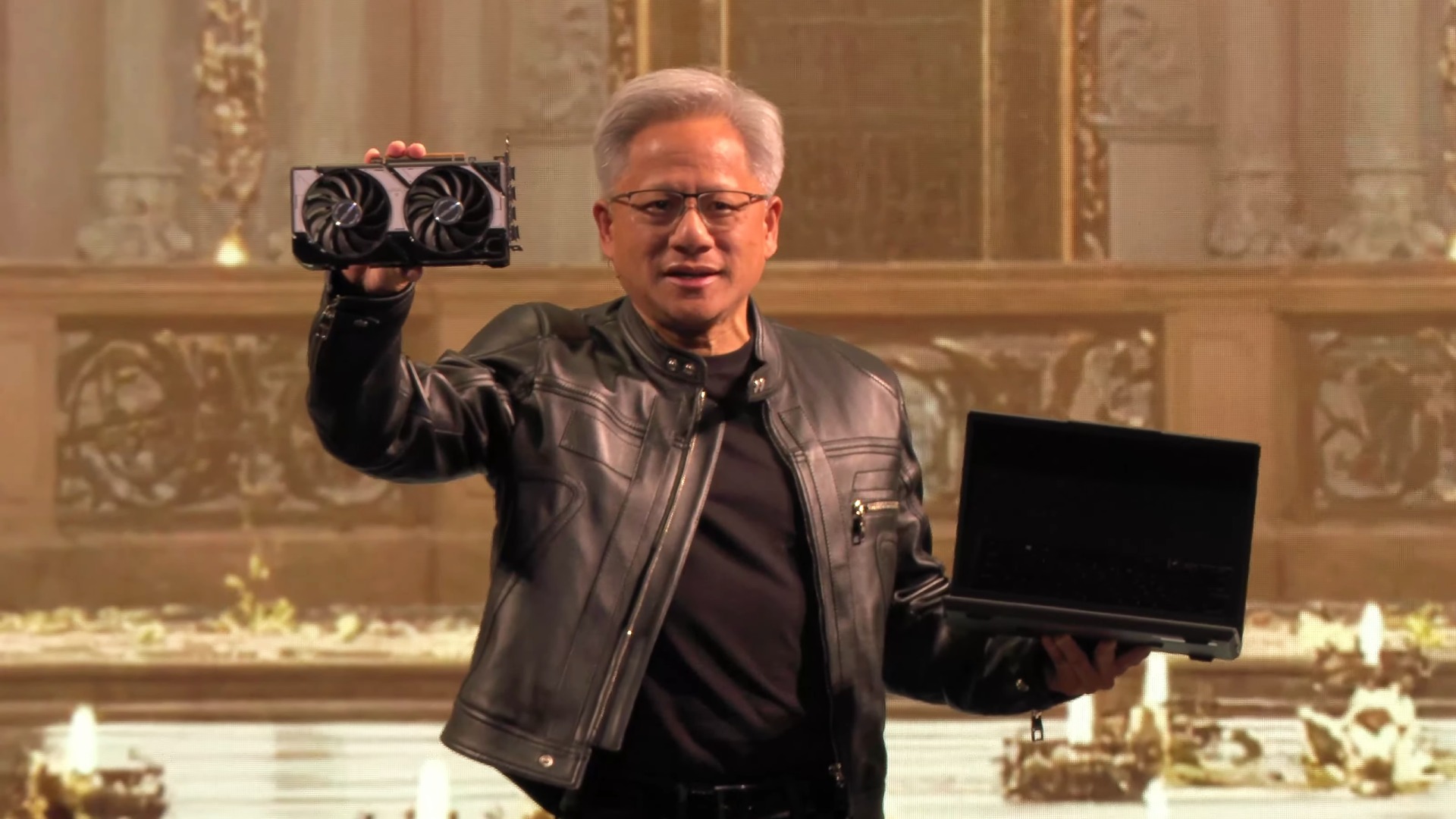 Nvidia CEO Jensen Huang at Computex 2025 holding RTX 5060 and laptop, source: Nvidia