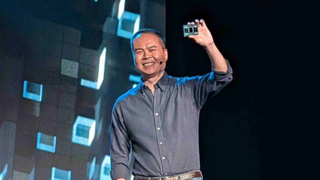 AMD Jack Huynh holding AMD Ryzen processor, image by PC Guide