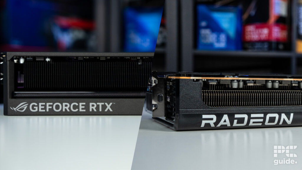 A side-by-side image of a GeForce RTX ROG Astral on the left and a Radeon RX ASUS Prime in the right graphics cards both sitting on a table with a blurred bookshelf in the back with PC hardware boxes.