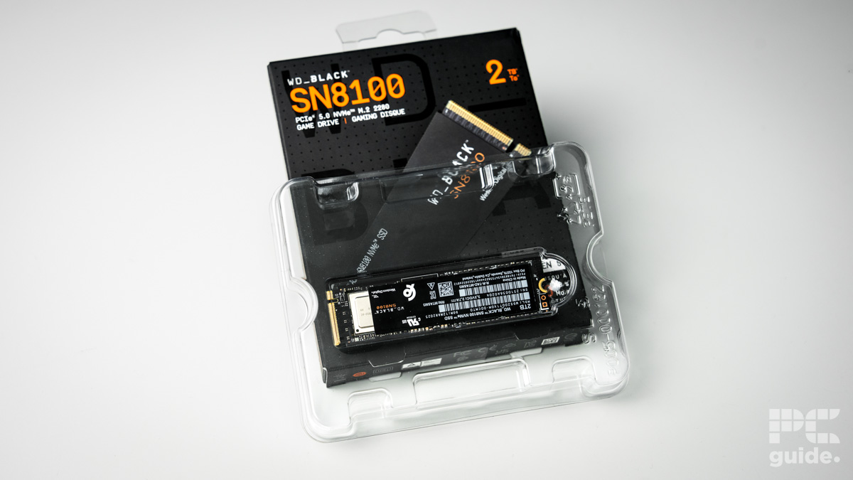 WD_Black SN8100 NVme in its plastic box on top of the outer box all on a table.