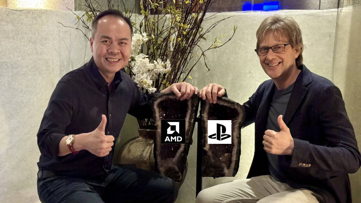 Photo of Jack Huynh on the left and Mark Cerny on teh right. Both are holding their thumbs up and squatting next to an amethyst split in half. There is an AMD and PlayStation logo on either side.