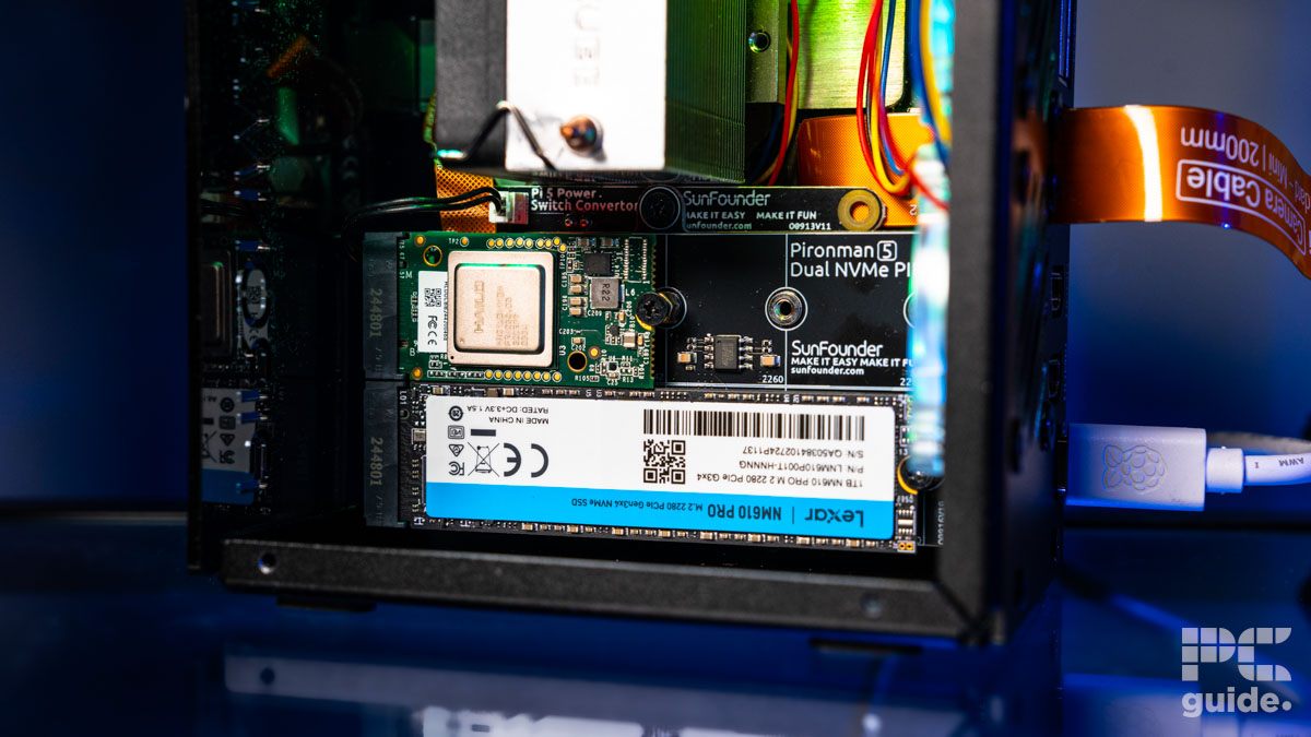 The Pironman 5 Max case inside with the PCIe board that shows a Lexar NVMe 2280 SSD and Raspberry Pi AI chip installed.