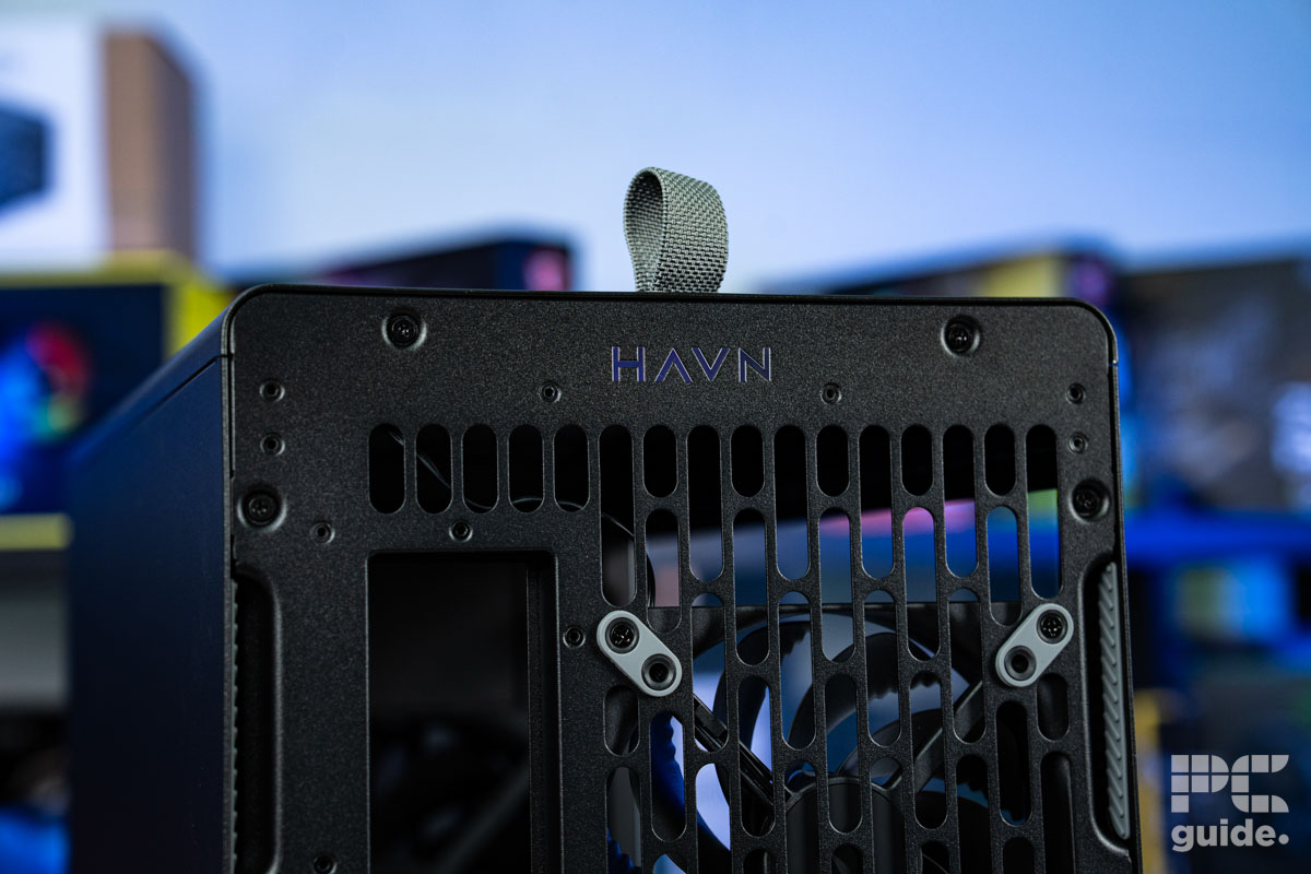 The rear of the HAVN BF 360 Flow case, it has a HAVN logo at the top, with a fabric loop at the top, and a fan installed on the back.