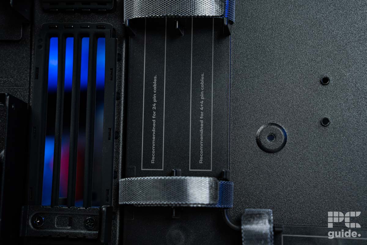 A close up of the HAVN BF 360 Flow left side panel, it shows the cable channel with writing on what each channel was made for.