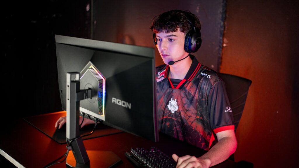 Zack 'Stompn' Lamb gaming on the AGON PRO AG276QKD2, credit: AOC