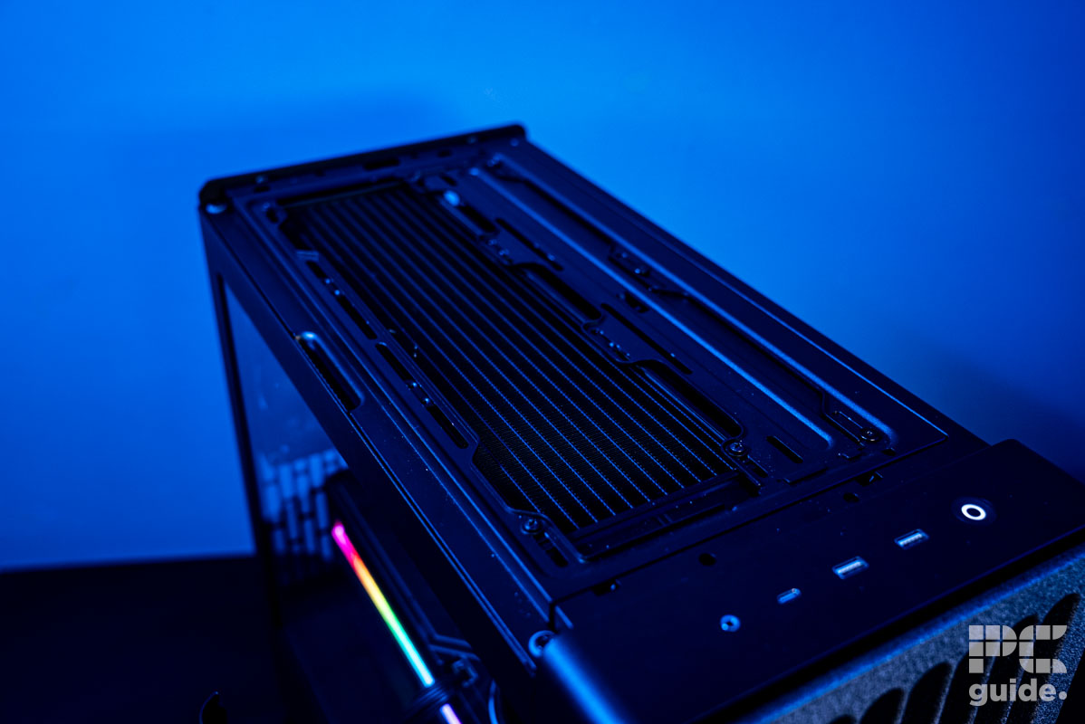 A shot down at the top of the HAVN BF 360 Flow case featuring a radiator and the front IO.