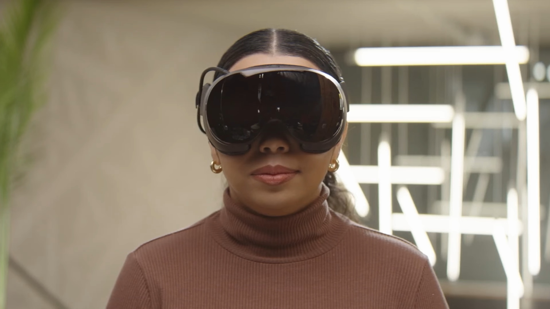 Woman wearing Steam Frame VR headset